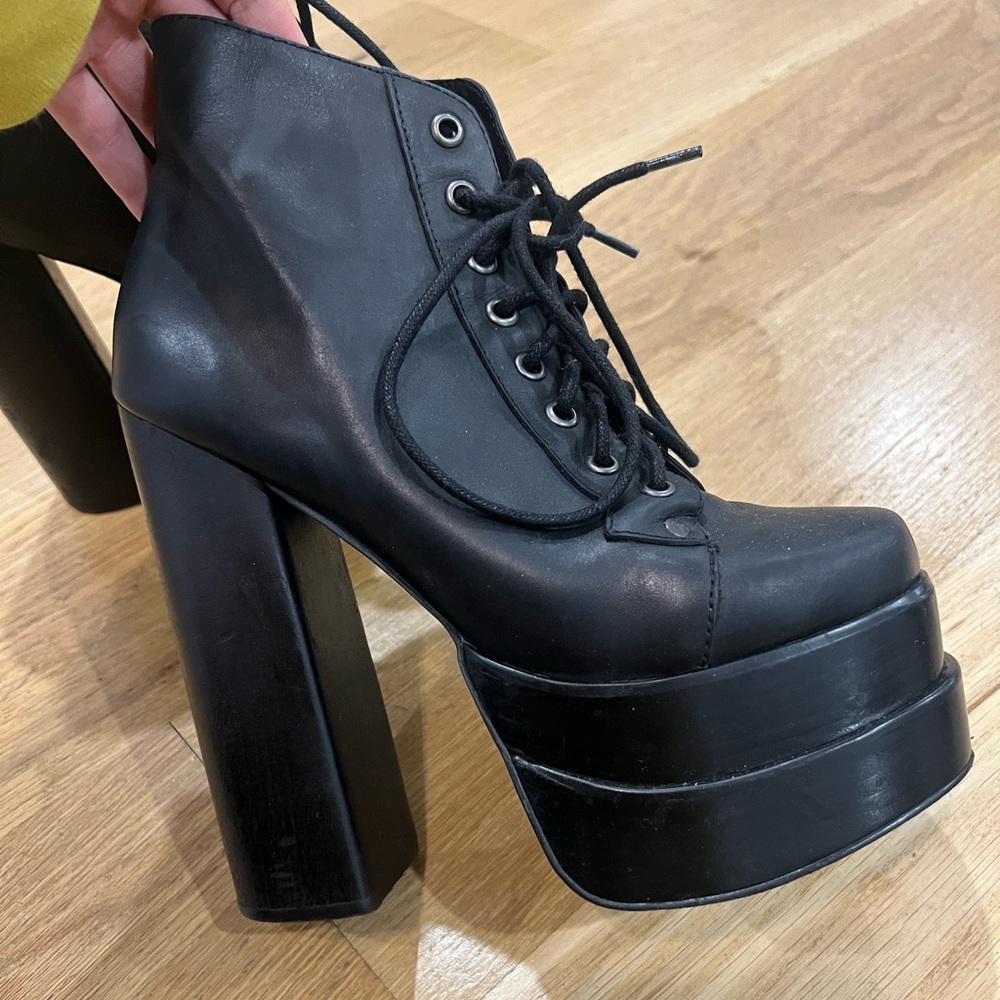 Jeffrey Campbell black leather boots.